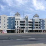 Luxury 3 Bedroom 3 Bath Condo with Roof Top Pool. One Block from Beach and Bay